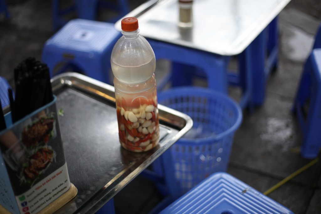 bottle of vinegar on a table
